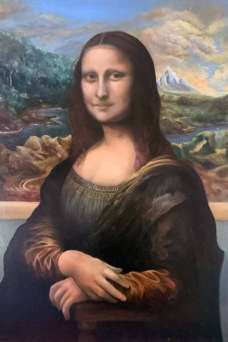 A close oil copy of the Mona Lisa, set against a reworked landscape of hills, winding water and a sharp peak.